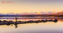 o lago tekapo durante o por do sol, um dos principais pontos turísticos da nova zelândia