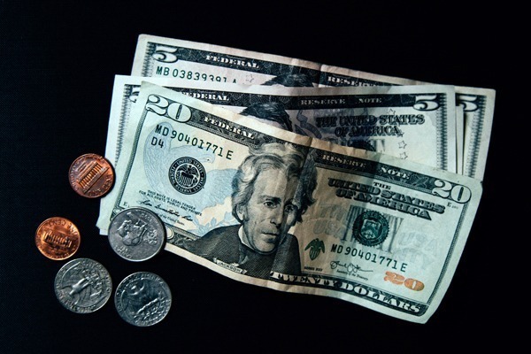 Notas e moedas de dólares
