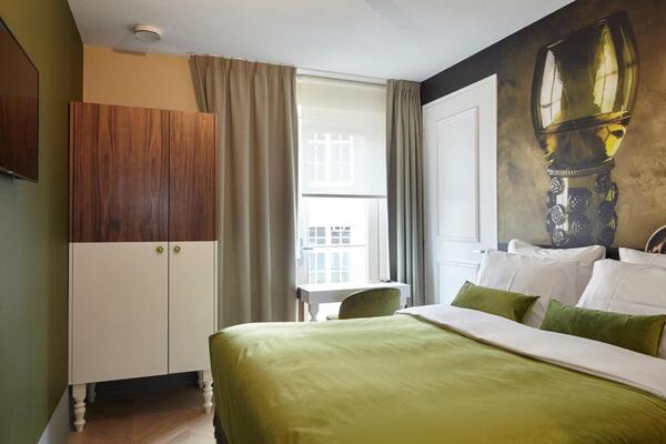 Foto de um quarto do hotel The Muse em Amsterdam, um dos hotéis baratos da cidade