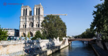Pontos turísticos de Paris: A Notre Dame em reformas com andaimes na beira do Rio Sena